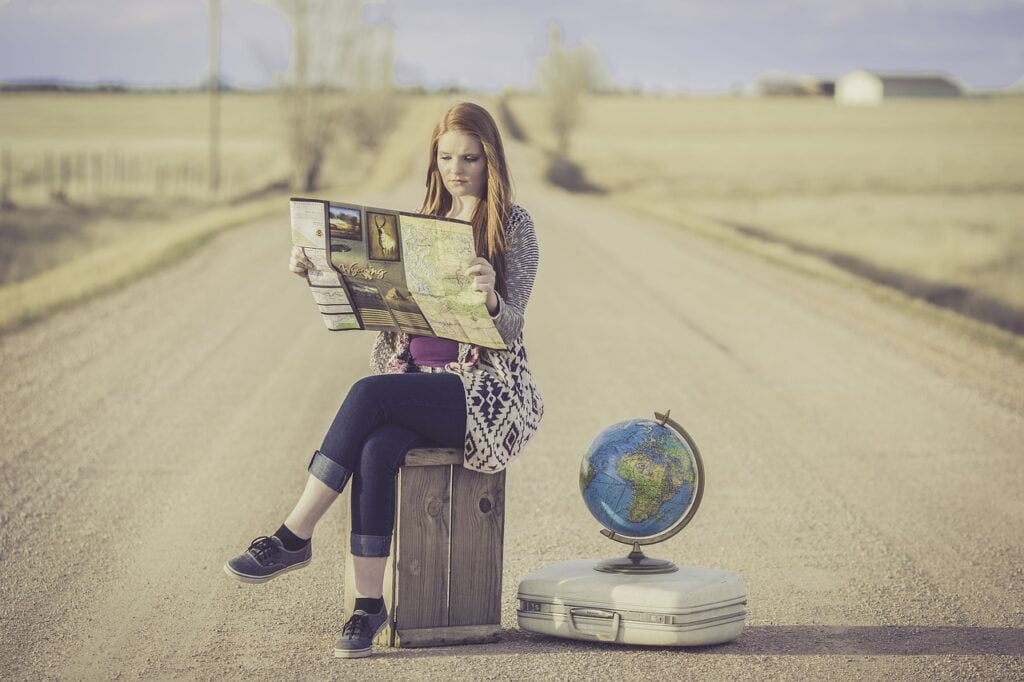 a lady looking map in the middle of street.jpg
